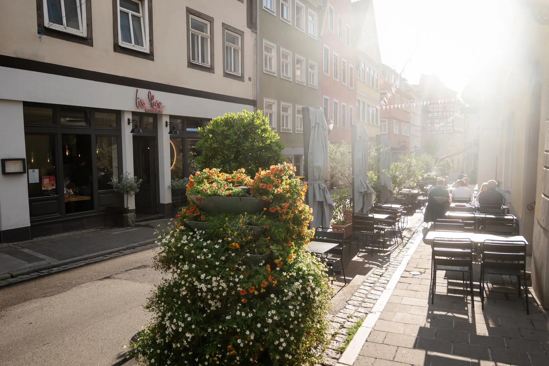 Steingasse in Coburg in the evening light, Lisa Marie's terrace in front