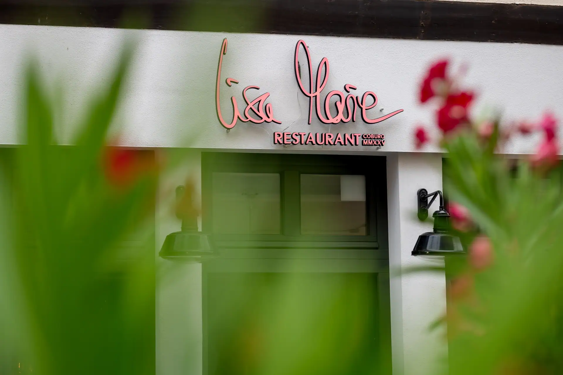 The facade of Lisa Marie with the lettering above the door