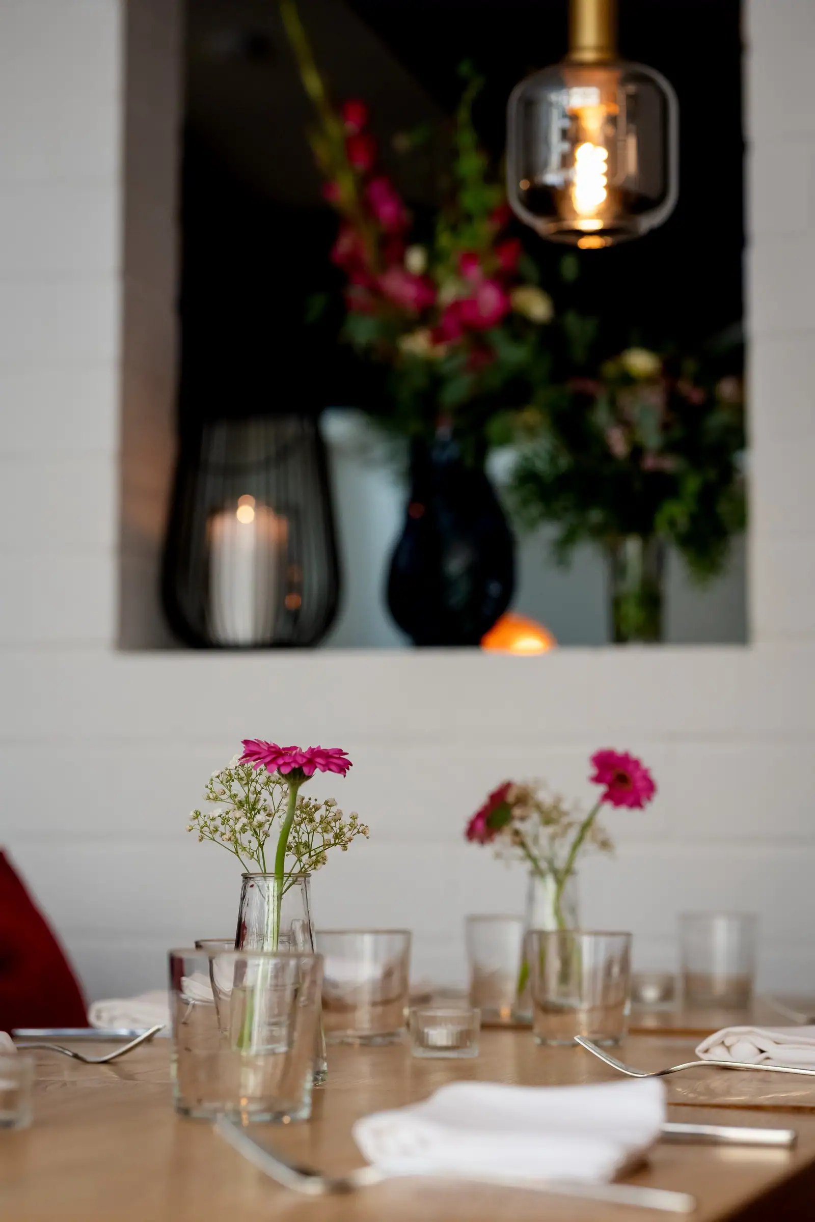 Window pass-through with flowers and candlelight