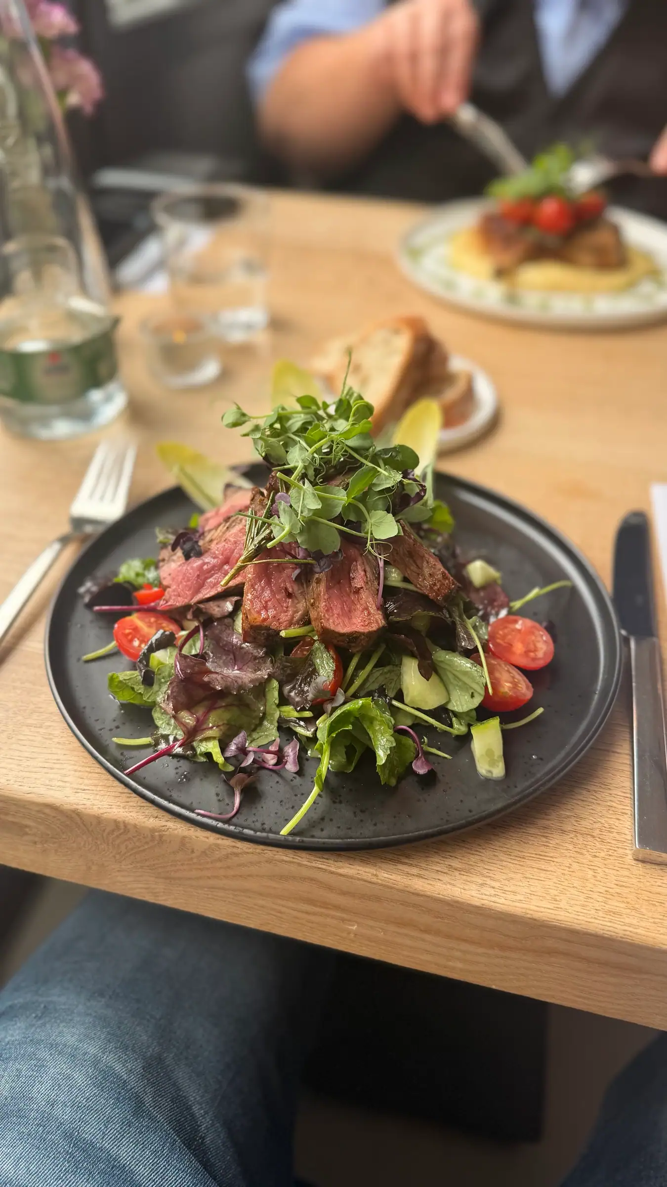 Wild herb salad with pink roast beef strips
